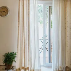 For a subtle and elegant look, our Tulsi Linen curtain is paired with the delicate Dew Sheer. This combination is perfect for creating a calm, neutral, and sophisticated window treatment.