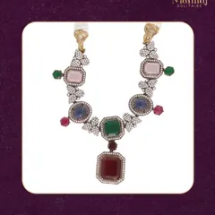 Uncut, unpolished, and unapologetically beautiful. This necklace showcases the raw beauty of Polki diamonds, set with multi-colored gemstones for a vibrant, regal look.