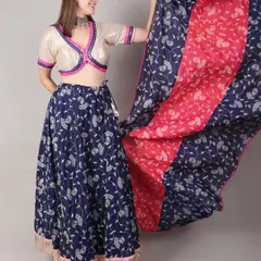 Feel the joy of Navratri in this royal blue lehenga, designed for both style and comfort during Dandiya nights. The flowing skirt and detailed blouse are crafted to let you dance freely while looking effortlessly elegant.