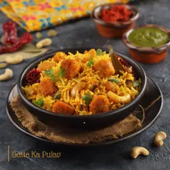 A closer look at our Gatte Ka Pulav, a flavourful one-pot rice dish. Soft gram flour dumplings (gatte) are cooked with aromatic basmati rice and spices, making for a satisfying meal.