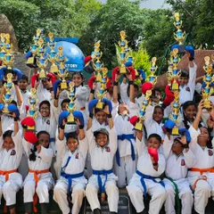 The smiles of champions. This is the result of hard work and dedication, with my students proudly holding up their trophies after a successful competition. Every win is a celebration for our entire academy.