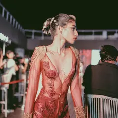 A model on the runway at our URBN fashion night. The event provides a platform for designers to showcase their collections to a live audience in a vibrant, energetic setting.