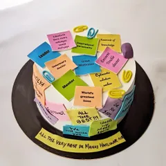 One of my favorite ways to create a farewell cake is by using edible sticky notes with messages from the team. This design for a departing boss is filled with personal tributes, making it a truly collaborative and heartfelt gift.