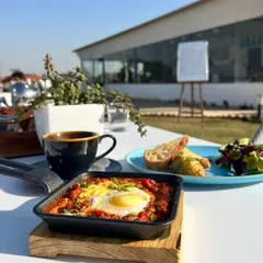Start your day with a hole-in-one breakfast. This delicious egg dish, served with a view of the greens, is the perfect way to fuel up before you play.