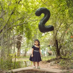 A wider view of the second birthday shoot, showing how the natural landscape of the park creates a stunning backdrop for milestone photos.