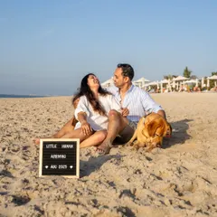 An unforgettable beach maternity shoot in Dubai, announcing a new "little human" on the way. Astro, the handsome Labrador, was the perfect companion for this special milestone. Outdoor lifestyle sessions like this are perfect for capturing your family's next chapter.