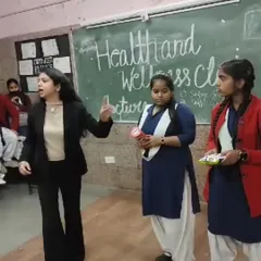 A practical activity with students to help them identify healthy versus unhealthy snacks. Here, I'm discussing the hidden sugars and fats in popular packaged foods.