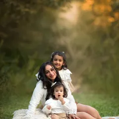 A beautiful portrait of a mommy with her two sweet girls. I've watched this family grow, and it's an honor to capture their journey together.