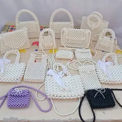 Beyond crochet, I also craft these intricate beaded handbags. This image showcases the different styles available for bulk order, from small clutches to larger totes and sling bags.