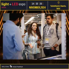 Engaged in deep conversation, attendees discuss technology and business, highlighting the expo as a hub for meaningful industry connections.