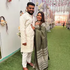 Posing with my brother, wearing our mother's treasured saree. It’s amazing how a single piece of clothing can hold so many memories and so much love.