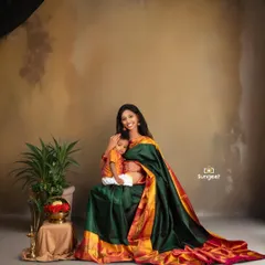 Timeless elegance in a traditional silk saree. A maternity shoot is a wonderful opportunity to celebrate your culture and create regal, artistic portraits with your older child.