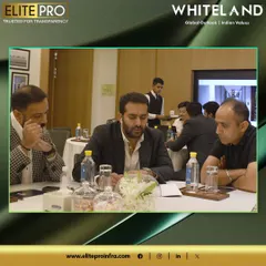 Our leadership in a detailed discussion with clients at the Whiteland property event. These interactions allow us to provide personalized advice and insights on new investment opportunities.