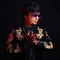 This stylized shot in a dragon-embroidered jacket reflects my belief that miracles are possible once you embrace the struggle.