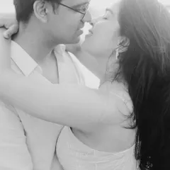A tight, intimate black and white shot of Ritu and Tarush. By focusing closely on their faces, I captured the raw emotion and connection in this quiet moment, away from any distractions.