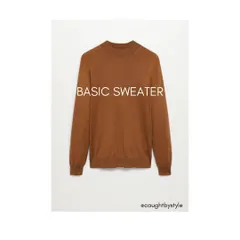 A basic sweater in a neutral color is a must-have for any man's winter wardrobe. It's a versatile piece that can be layered over a shirt or worn on its own for a clean, classic look.