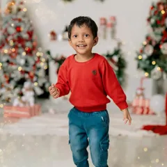 The holiday season through a child's eyes is pure magic. This portrait captures that sense of wonder and happiness, a perfect memory of Christmas time.