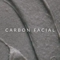 The texture of the activated carbon mask used in our Carbon Facial. This treatment is excellent for anyone dealing with clogged pores, acne, or a tired, dull complexion. It's a powerful detox that helps reset your skin.