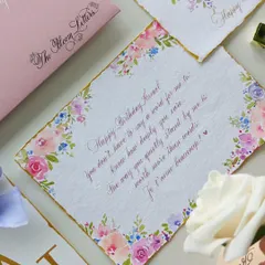 The thought of receiving a handwritten letter, painted with love, is truly beautiful. This birthday note features delicate florals on deckled edge paper, a keepsake to treasure.