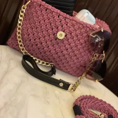 The magnetic clasp keeps your belongings secure, and you can see there's enough room for a wallet, sunglasses, and other daily essentials inside this handmade purse.