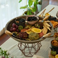 A beautifully arranged cheese and charcuterie platter for a baby shower. I work with trusted partners to ensure that every aspect of your event, including the food, is presented with style.