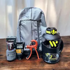 This fitness-themed hamper is perfect for the health-conscious man. It includes a lightweight backpack, a large water gallon, a hand gripper, protein bars, and men's skincare products.