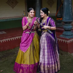 The vibrant colors of the sarees and the traditional props like sugarcane make these festival portraits lively and authentic.