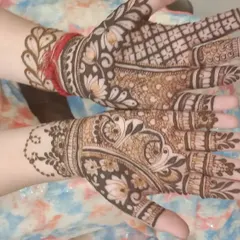 A beautiful example of a shaded Arabic mehndi design. The use of light and dark henna creates a lovely depth, perfect for any festive occasion.