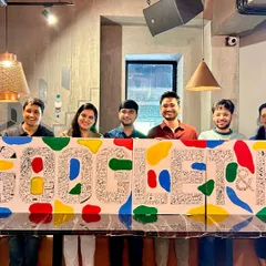 A close-up of the incredible 'Google T&R' doodle art. The team worked together to fill the letters with personal and professional symbols, and then we peeled back the tape for the big reveal.
