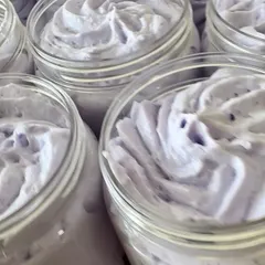 Jars of freshly piped Lavender Whipped Soap. The calming scent of lavender essential oil makes this the perfect addition to your nighttime relaxation ritual.