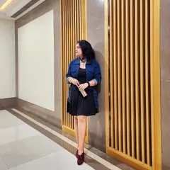A simple black dress layered with a denim jacket is the ultimate casual chic look. It's versatile, comfortable, and always in style.