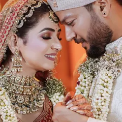 It's the quiet moments of connection that tell the loudest love stories. I focus on capturing the genuine smiles and gentle touches that you'll cherish forever, like this beautiful close-up portrait.