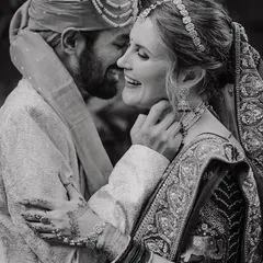 I love the pure joy in this black and white candid. It’s the unposed, real laughter that makes the best couple portraits.