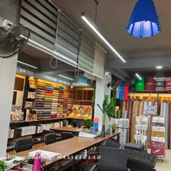 Inside the showroom, you can see various blind types installed, browse countless fabric sample books, and see our rolls of materials. This helps you make an informed decision for your home or office.