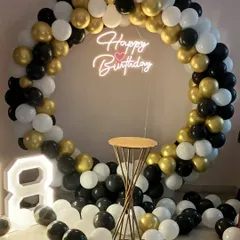 Another view of the 18th birthday decor, showing the balloons scattered on the floor for a fuller look.