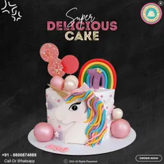 A magical unicorn cake featuring a colorful rainbow mane and a sparkling horn. This design is adorned with pink and pearl-like spheres, making it a truly enchanting centerpiece for a birthday.