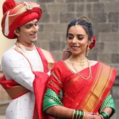 A classic Maharashtrian groom look for a wedding ceremony. I styled the traditional red Pheta and ensured his makeup was flawless yet understated, perfectly complementing the bride's divine look for their special day.
