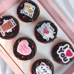 A closer look at the 'Love Notes' cupcake toppers. You get adorable messages like 'my butter half' and 'you complete me'.
