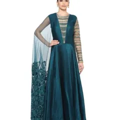 Make a grand entrance with this teal green gown by Ridhima Bhasin, featuring a dramatic embroidered cape. The combination of a sleek silhouette, embellished sleeves, and a deep V-neck creates a look that is both elegant and bold, perfect for a cocktail party or reception.