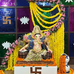 A vibrant shot of our Ganpati idol, surrounded by flowers and decorations, ready for the festivities at our academy.