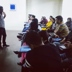 Classroom instruction during our BLS workshop. We learn the theory from certified medical professionals before we practice the hands-on skills.