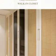 My design philosophy extends beyond the kitchen into every corner of the home. This walk-in closet, with its blend of natural wicker and glass, is an example of how I bring the same attention to detail and warmth to personal spaces, creating storage that is both functional and beautiful.