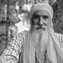 A still photograph is a frozen moment you can always return to. The calm wisdom in this man's eyes, framed by his flowing white beard, is a portrait of time and experience I found in the streets of Rajasthan.