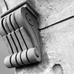Details matter. This close-up shot shows the intricate carving of a French-style moulding on a column. These small quirks and crafted elements have a big impact on the overall feel and sophistication of a space.