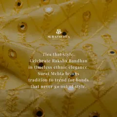 Ties that style. This detail shot shows the mirror work and embroidery on a festive yellow fabric, bringing tradition to trend for bonds that never go out of style.