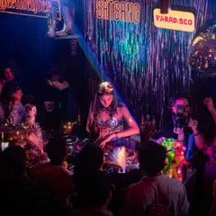 Behind the decks at a Paradisco night, surrounded by glitter, disco balls, and the best crowd. I put my heart into curating every detail of these events to create a truly immersive disco and house music experience.