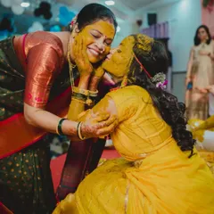A heartwarming moment between the bride and her mother during the Haldi ceremony.