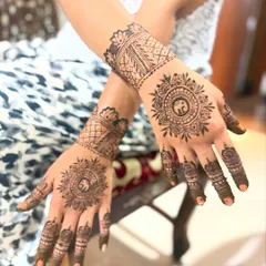 The same beautiful elephant mandala design, shown here before the henna paste is scraped off. You can see the clean lines and detail that go into every piece.