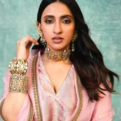 A close up on the stunning Amrapali jewelry styled for Akansha Ranjan Kapoor. The intricate choker and oversized ear cuff added a touch of royal grandeur to her look.