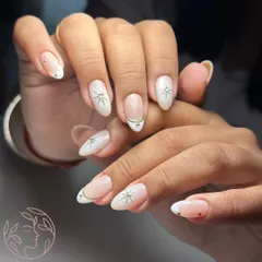A chic and modern take on a classic look. This set combines aura art, isolated chrome lines, and delicate star details for a celestial and elegant design.